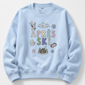 Light blue sweatshirt with colorful 'APRèS SKI' graphics on a white background
