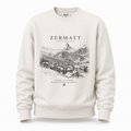 An off-white crewneck sweatshirt featuring a black line art graphic of Zermatt, Switzerland, with the text 'ZERMATT SWITZERLAND' and 'Matterhorn Paradise' printed on the front
