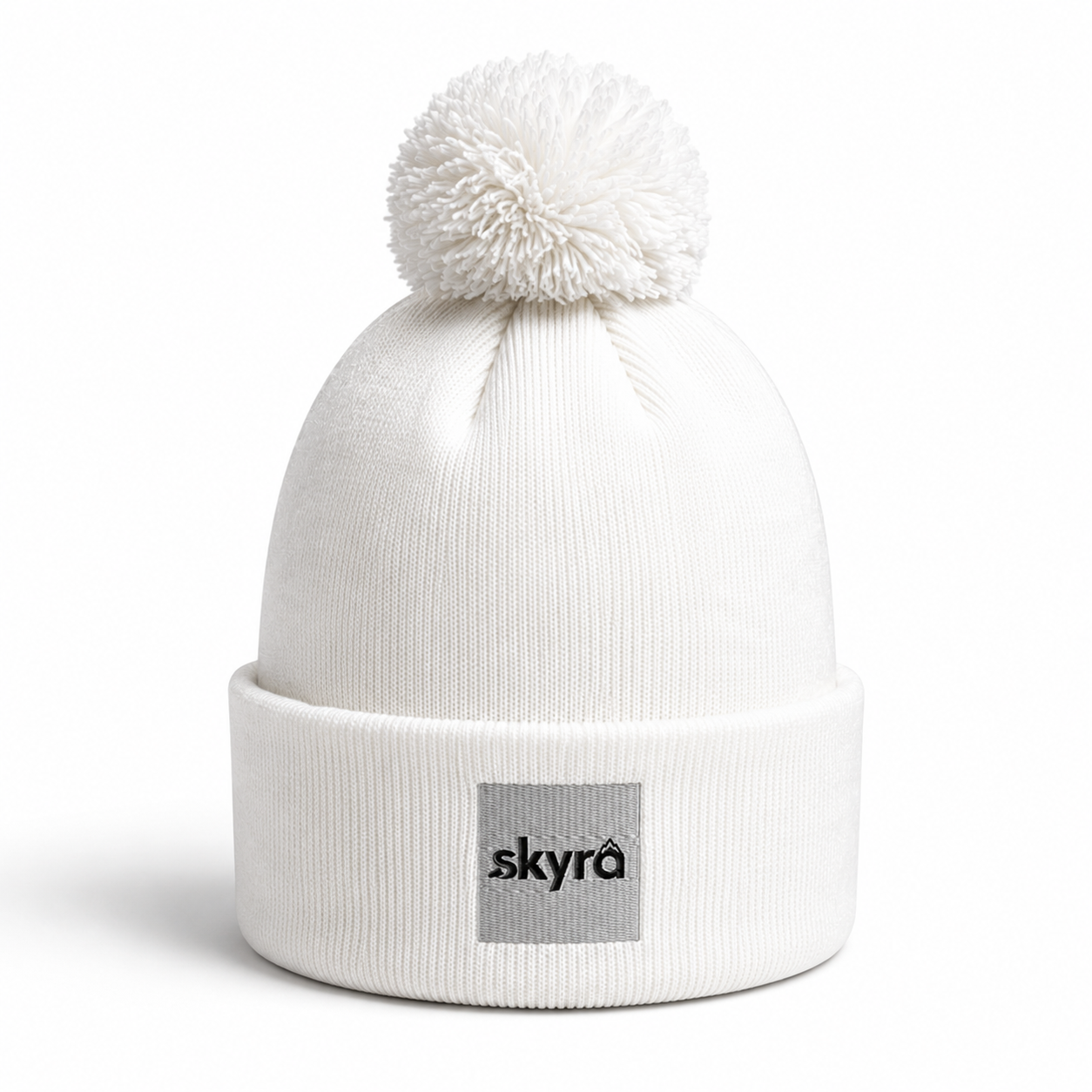 Skyra - Pom Pom Beanie
